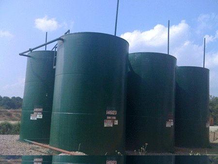 Brine water tanks (collect residual frac water as it returns to the surface over time). EQT Corp. drilling site located near the Borough of Waynesburg in Greene Co., PA about 60 miles southwest of Pittsburgh. Photo credit Josephine Sabillon.